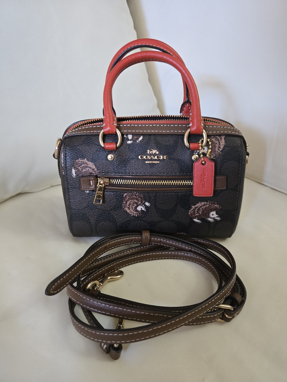 COACH Brown Signature Canvas Mini Rowan Hedgehog Rare Print with Red Handles